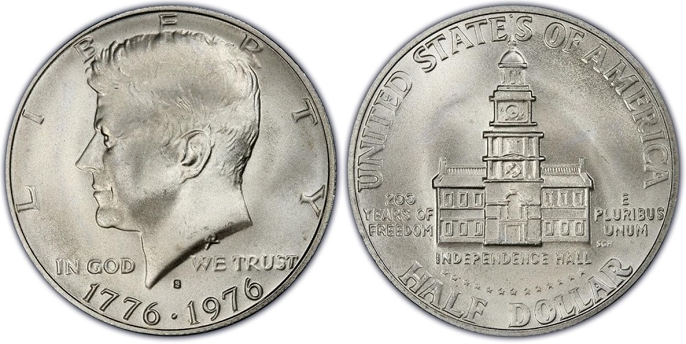 1976 Kennedy half dollar edge comparison showing clad copper stripe versus silver half uniform white edge